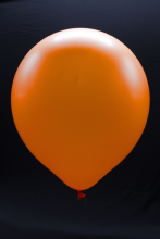 25 ballons ovales orange fluo 45 cm